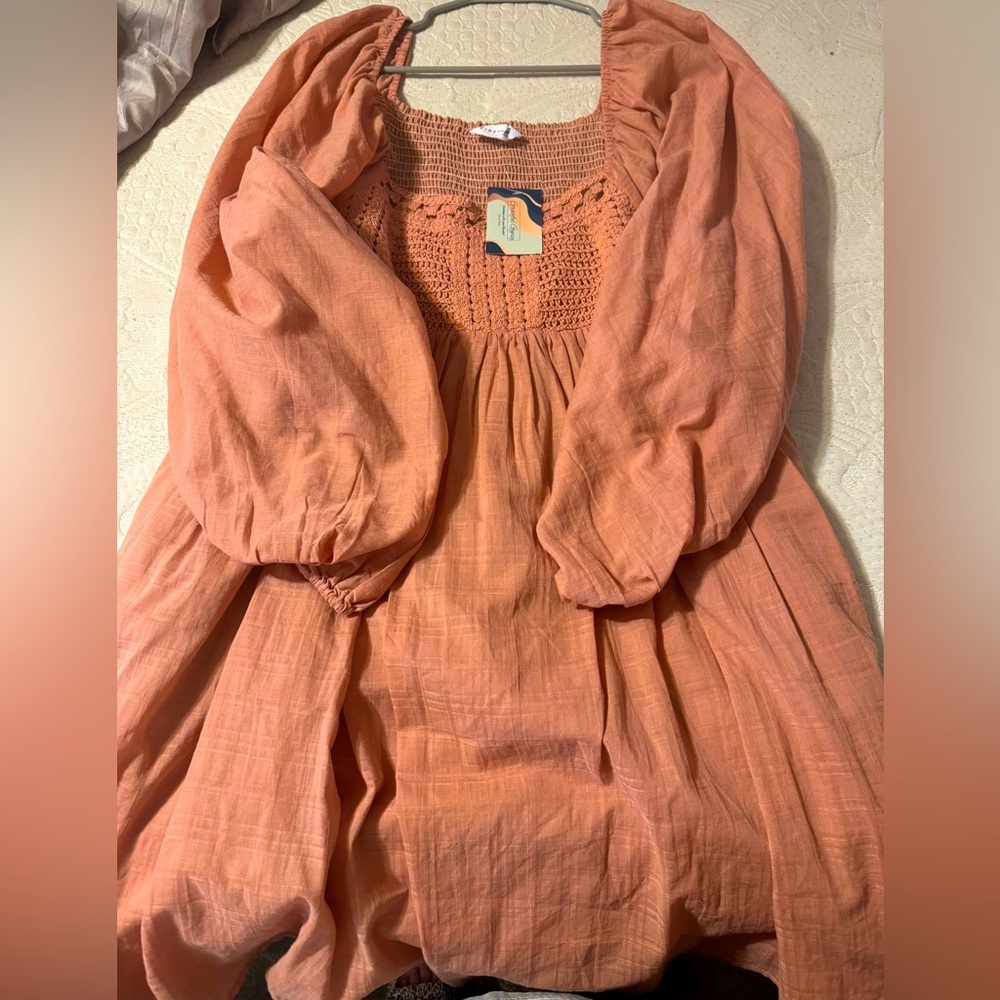 Size 1X babydoll dress. NWT.